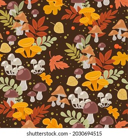 Seamless pattern from autumn leaves and mushrooms on dark background