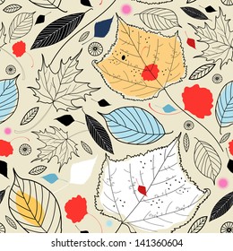 Seamless pattern of autumn leaves on a light brown background