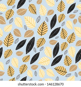 Seamless pattern of autumn leaves on a blue background