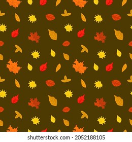 Seamless pattern with autumn leaves on dark background