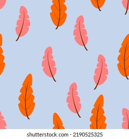 Seamless pattern with autumn leaves on blue background vector illustration.