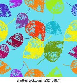 Seamless pattern of autumn leaves on an azure background. 