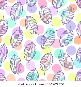 Seamless pattern with autumn leaves on a polka dot background.