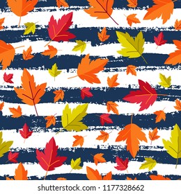 Seamless pattern with autumn leaves in Orange, Beige, Brown and Yellow. Perfect for wallpaper, gift paper, pattern fills, web page background, autumn greeting cards.