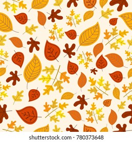 Seamless pattern with autumn leaves in Orange, Beige, Brown and Yellow. Ideal for wallpaper, autumn greeting cards, gift paper.