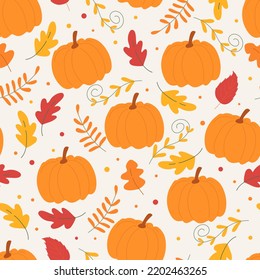 Seamless pattern with autumn leaves and pumpkins. Autumn cozy concept for wrapping paper, textile