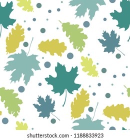 Seamless pattern with autumn leaves silhouettes and dots in vector with maple tree and oak tree leaves