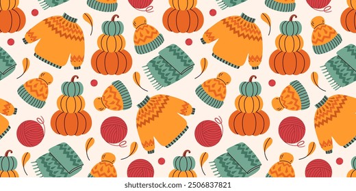 Nahtloses Muster mit Herbstblättern, Pullover, Schal und Hut. Strickbekleidung. Orange warme Farben. Fallende Periode. Thanksgiving. Herbstliches, gemütliches Konzept zum Verpacken von Papier, Hintergründen und Textilien.