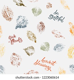 Seamless pattern with autumn leaves.Vector background with leaves and hand written lettering. Suitable for wrapping paper, textile or book covers, wallpapers, design, graphic art, printing. EPS 8