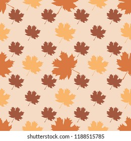 Seamless pattern with autumn maple leaves. Vector pale colored illustration