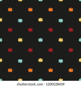 Seamless pattern with autumn maple leaves. Red, blue and yellow leaves on dark background. Vector illustration