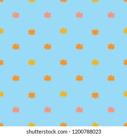 Seamless pattern with autumn maple leaves. Orange, yellow, red leaves on blue background. Vector illustration