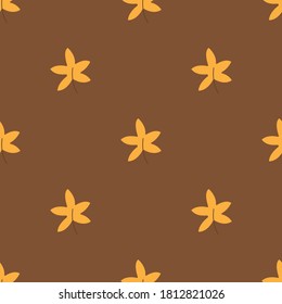 Seamless pattern with autumn maple leaves on a brown background. Wrapping paper or fabric. Colorful vector illustration