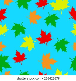 Seamless pattern with autumn maple leaves on turquoise background.