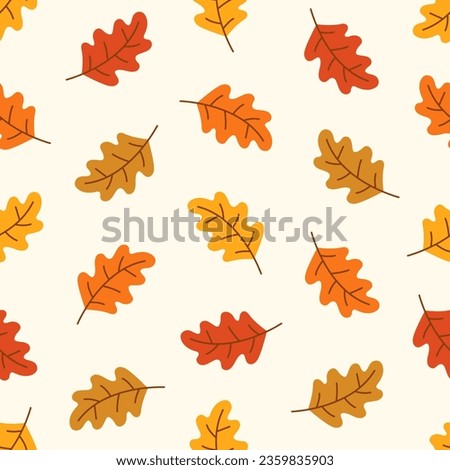Seamless pattern with autumn oak leaves in red, beige, yellow and orange. Perfect for wallpaper, gift paper, textile, greeting cards.