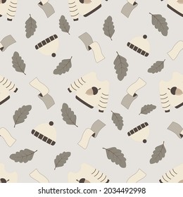 Nahtloses Muster. Herbstkleidung: Pullover, Schal, Hut. Vektorhintergrund in Pastellfarben. Herbstdesign für Kleidung, Textilien, Gewebe