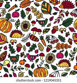 Seamless pattern with autumn symbols in doodle style