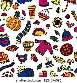 Seamless pattern with autumn symbols in doodle style