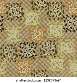 Seamless pattern. Autumn theme. Foliage and squares on the diagonal-striped background.