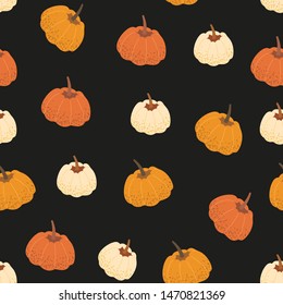 Seamless pattern with autumn theme ornament. Vector illustration of colorful pumpkins that can be used as textile, fabric, wrapping paper, walpaper print and other decorations.