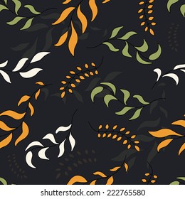 Seamless pattern of autumn yellow and green branches and leaves on a dark background, fully editable vector texture for your design.