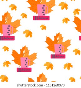 Seamless pattern. Autumn yellow leaves and books with a cup of tea