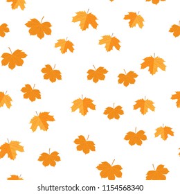 Seamless pattern of autumn yellow leaves randomly