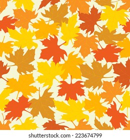 Seamless pattern with autumnal maple leaves .Vector illustration.