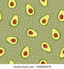 Seamless pattern with avocado on green dotted background. Hand drawn texture for textile, print, packaging.