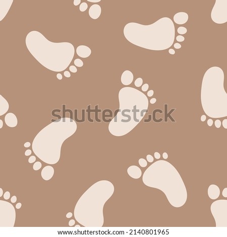 Seamless pattern with baby footprints and brown background
