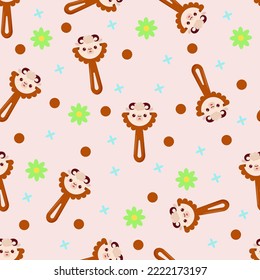 Seamless pattern with baby lamb rattle. Children's pattern on textiles. Gentle children's  pink   background
