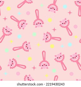 Seamless pattern with baby pig rattle. Children's pattern on textiles. Gentle children's  pink   background