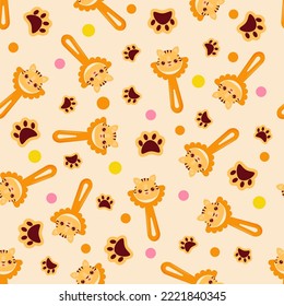 Seamless pattern with baby tiger rattle. Children's pattern on textiles. Gentle children's  yellow background