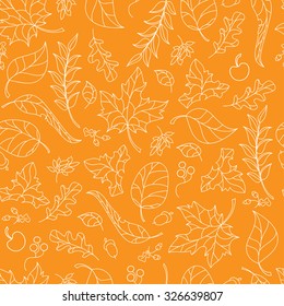 Seamless pattern background with autumn leaves, berries and acorns