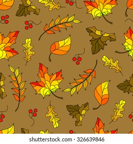 Seamless pattern background with autumn leaves and rowan berries