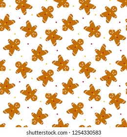 Seamless pattern background with candies and gingerbread men, christmas traditional cookies, biscuits, whole and with teeth bite mark.