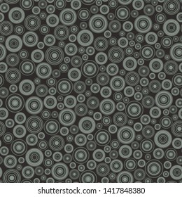 Seamless pattern, background consisting of non-overlapping colored geometric elements of a round shape. Useful as design element for texture and artistic compositions.