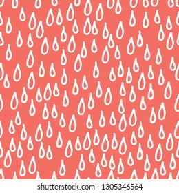 Seamless pattern background. Coral color. Hand drawing abstract doodle of water drops or rain. Vector.