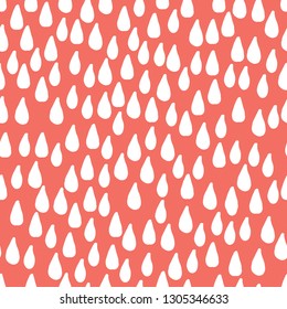 Seamless pattern background. Coral color. Hand drawing abstract doodle of water drops or rain. Vector.