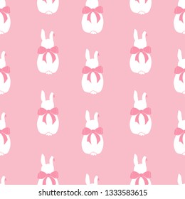 Seamless pattern background with cute girly bunny rabbits with bows. Seamless easter pattern