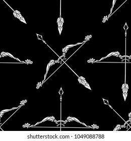 Seamless pattern, background with ethnic patterned ornate hand drawn bow and arrow Black-and-white graphics. White on black background.
