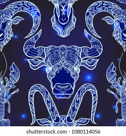 Seamless pattern, background with ethnic patterned ornate hand drawn head of goat, bull, ox, cancer, sheep, ram .  On dark blue spase background with stars. 