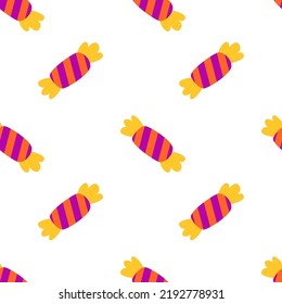 Seamless pattern background of halloween trick or treat candies. Bright candies and sweets in the traditional colors of Halloween.