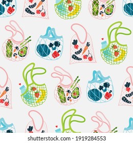 Seamless pattern background with reusable net bags and groceries. Eco-friendly shopping tote bags. Zero waste concept. Hand drawn vector illustration.