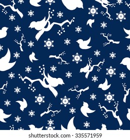 Seamless pattern background with silhouette of beautiful winter snowflakes and bullfinches sitting on rowan branches with berries. Merry Christmas and Happy New Year. Vector illustration.