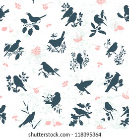 Seamless pattern background with songbirds silhouettes