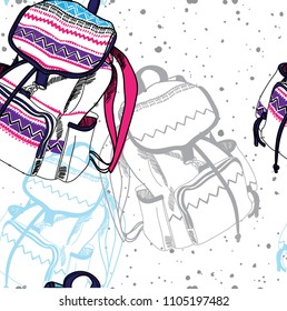 Seamless pattern with backpacks. Time to travel. Drawing by hand. Stylish summer background.
