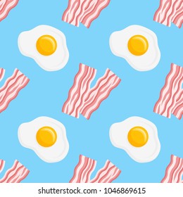 Seamless pattern with bacon strips and fried eggs on blue background. Vector texture.