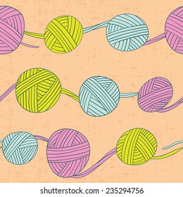 Seamless pattern with balls of yarn. Hand drawn illustration of knitting. Hobby background in cartoon style.