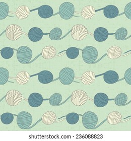 Seamless pattern with balls of yarn. Hand drawn illustration of knitting. Hobby background in cartoon style.